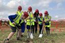 Children from Fred Nicholson School break the ground for its new site in Swaffham