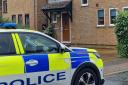 A house in John Amner Close, Ely, remains taped off this afternoon (September 26) following the discovery of a human bone in a garden on September 24. 