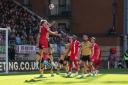 Leyton Orient's Brandon Cooper wins a header against Wrexham. Picture: JAMES MANNING/PA