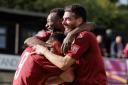 Brandon Adams is mobbed by Isaac Currie and Ronnie Henry after scoring the first for Potters Bar against Lewes. Picture: MANDY DAVIES