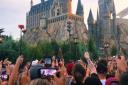 Harry Potter fans have paid tribute to Dame Maggie Smith by raising their wands at the Hogwarts Castle in Florida.