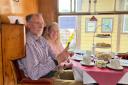 Dunmow Probus Club members enjoying an afternoon tea on the train