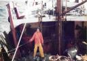 John Fisher on the deck of a trawler off East Anglia during the 1970s