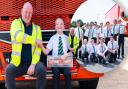 Dean Hill (left), a driver trainer for Knowles, pictured with Simon, a lorry-mad Thomas Clarkson Academy student.