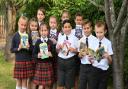 Students at Peckover Primary School in Wisbech with their new books thanks to the seventh year of MP Steve Barclay's annual Read to Succeed campaign.