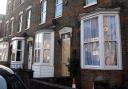 Boarded up house in St Augustine's Road, Wisbech, following drugs raid. Workmen turned up mid afternoon on January 4 after police had smashed their way into the property.