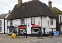 The Grade II-listed property on Market Street in Whittlesey includes two fully occupied flats and two commercial units.