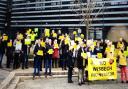 Campaigners gathered outside The Boathouse Business Centre in Wisbech where public hearings into plans to build an incinerator will take place.