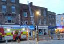 Firefighters tackled a roof blaze above the Sue Ryder shop in Wisbech Market Place.