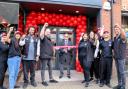 Deputy Mayor Cllr Peter Human cutting the ribbon on Wendy's in Wisbech.