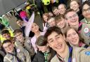 The Scouts managed to get a selfie with pop superstar Katy Perry with Katy Perry outside the Abbey following the Service.  Wisbech Explorer Scout Henry Fuller is pictured next to Katy on the left.