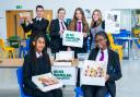 The bake sale in November was organised by student Lia, who is seated on the left in this photo.