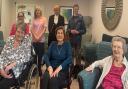 The High Sheriff of Cambridgeshire Dr Bharatkumar Khetani with residents and staff at Rose Lodge Care Home in Wisbech.