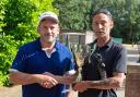 John Gamble Open winner Michael Ewing presented with his trophy by vice-captain Simon Smith.