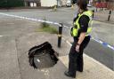 Police looking into one of the sink holes in Wisbech