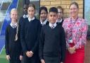 Dr Rachel Lawrence-Byron, Associate Principal at The Wisbech Academy, alongside some students at The Wisbech Academy.