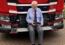 Wally, 91, in front of a fire engine in Wisbech