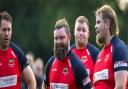 Nathaniel Humphreys (centre) awarded the Bowsers man of the match.