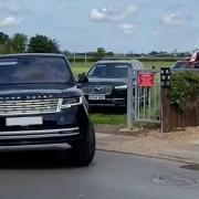 Princess Anne arrives at Wisbech Grammar School by helicopter.