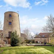 The view of the stone mill conversion from the garden