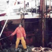 John Fisher on the deck of a trawler off East Anglia during the 1970s