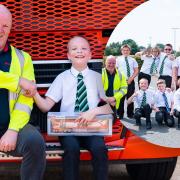 Dean Hill (left), a driver trainer for Knowles, pictured with Simon, a lorry-mad Thomas Clarkson Academy student.