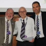 Trevor Darnes, Senior Environmental Health Officer (centre), receiving the 2019 Employee of the Year award from Cllr David Mason (left) Chairman of Staff Committee. Chief executive Paul Medd is pictured right. Mr Darnes is facing an uncertain future