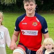 Solomon Prestidge with his daughters after collecting the Wisbech Round Table man of the match in the defeat to Thurston.