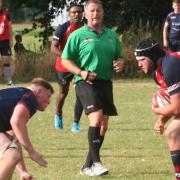 Wisbech's Nathan Goodale on the charge against West Norfolk.