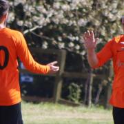 Jon Bartlett (right) celebrates after scoring for Witchford 96 against Bluntisham Rangers in the Cambridgeshire County League Senior Cup.