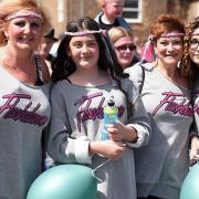 Organisers are hoping for a low-key return of the Chatteris Midsummer Festival, which this year, will hold a family colour fun run as well as other family-orientated events. Pictured: Some of the hundreds at the 2019 festival.