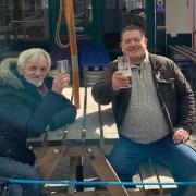 Drinkers catching up outside The Globe pub in Wisbech.