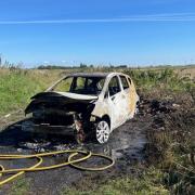 Appeal after car set on fire in the open in March