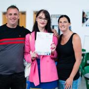 Ellie Smith with her parents Vicky and Steven.