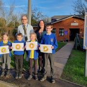 Year 3 pupil Maisie, Year 4 pupil Jenson, deputy headteacher Mr Wilkinson, Year 5 Roxy, headteacher Dawn Liddle, and Year 6 pupil Luke