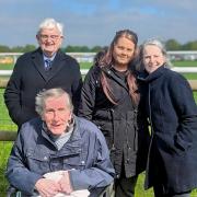 Residents including Richard at Fakenham Racecourse with deputy manager Sarah