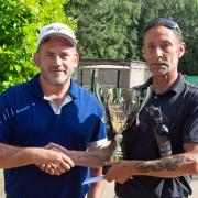 John Gamble Open winner Michael Ewing presented with his trophy by vice-captain Simon Smith.