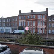 The White Lion Hotel in Wisbech, seen from the opposite bank of the River Nene