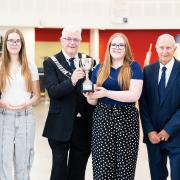 TCA business award student winners with Michael Bates, Derrick Holmes, Brian Kett and Peter Dennis of Wisbech B&PMC