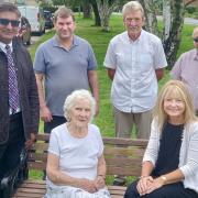 The bench handover was attended by Elm Parish Councillor Richard Welbourne, Robin Milham, local resident Martin Claxton, and Elm Parish Clerk Suzanne England.