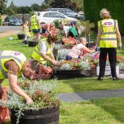 Volunteers from Murrow Street Pride Group enhancing the village together