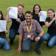 Students at Marshland High School celebrating after collecting their GCSE results