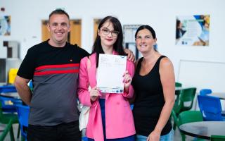 Ellie Smith with her parents Vicky and Steven.