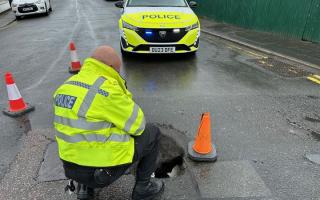 Officers cordoned off the affected areas with traffic cones.